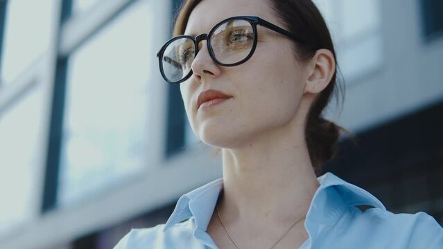 Scared young woman standing on bus station arrived to new city to start new life