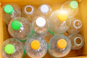 Hand hold old plastic bottles and containers set for recycling,Rubbish, rubbish, garbage, plastic waste, plastic waste pollution