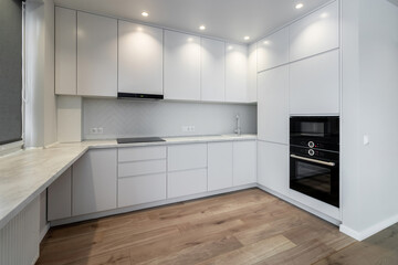 Modern bright new kitchen in a newly renovated apartment