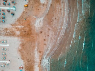 Fototapeta na wymiar Aerial view of Rimini beach with people and blue water. Summer vacation concept
