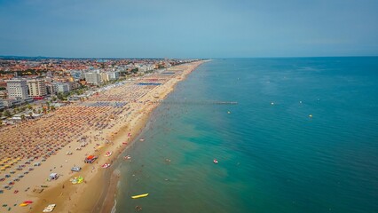Long Sea beach on the Adriatic Sea with vacationing people, view from a drone. Summer vacation,...
