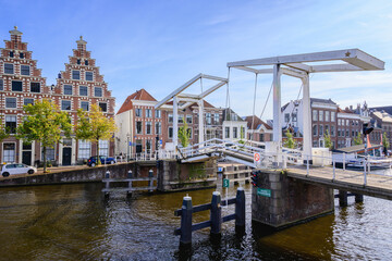 Gravestenenbrug - Bridge on Spaarne River and Old Canal Houses in Haarlem, Netherlands