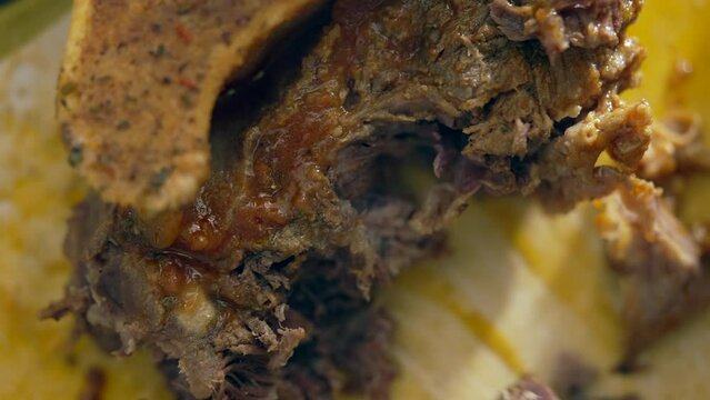 Gourmet Detail - Fork Shredding Osso Buco Meat in Macro Food Preparation,  Osso Buco macro Close-Up Culinary Scene, cooking food