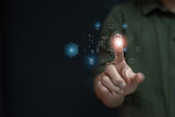 Businessman touches a virtual screen in the concept of networking and connecting, copy space for text.