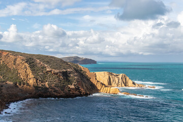 Port aux Princes, Tunisia, Cliffs and Rocks, Mediterranean Sea landscape with beautiful blue sky. Heavenly Escape. Takelsa