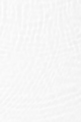 White water with ripples on the surface. Defocus blurred transparent white colored clear calm water surface texture with splashes and bubbles. Water waves with shining pattern texture background.