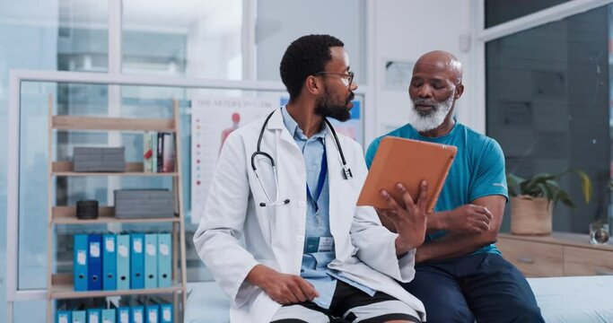 Senior man, physiotherapy and doctor on tablet for support, exercise advice and physical therapy exam. Physiotherapist, chiropractor and african people of elderly patient on digital tech for progress