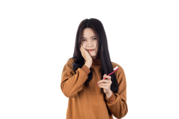 Young Asian woman have a toothache holding toothbrush isolated on white background with clipping path. Health and illness concept.