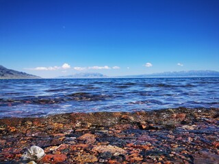 lake and rocks sailimu lake in xinjiang