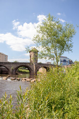 Fototapeta na wymiar Monmouth old bridge in the Summertime.