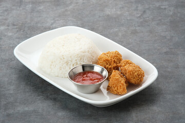 Crispy dory fillets (Ikan dori goreng tepung) with chilli sauce
