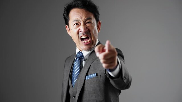 怒るミドル男性　ビジネスイメージ	