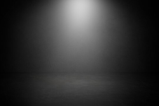 Black empty room studio with gradient white spotlight for display product

