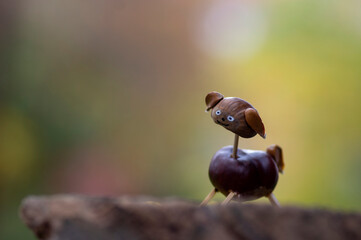 Good-hearted chestnut dog animal with cute face on natural background, traditional autumnal handcraft with children