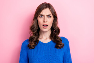 Photo of impressed shocked girl dressed blue knitted autumn clothes bad news information isolated...