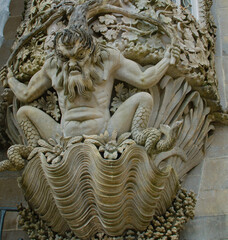 The sculpture of greek god triton in the national palace of pena, sintra, portugal