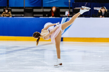 girl one leg skating in ice championship, figure skating single