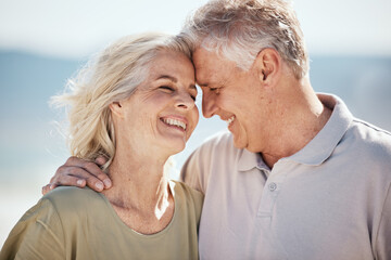 Senior couple, happy and outdoor at the beach with love, freedom and care on vacation. Face of a man and woman on retirement holiday, adventure and romantic trip in nature to relax and travel