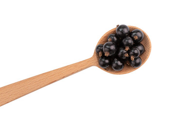 photograph of black currant berries in wooden spoon isolated on white background with clipping path, top view