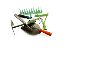 Garden tools, shovels, rakes, axe, hoe, hoe. a set of tools for the gardener. Gardening. The concept of spring work in the garden, a home hobby. On a white isolated background.space for text.	