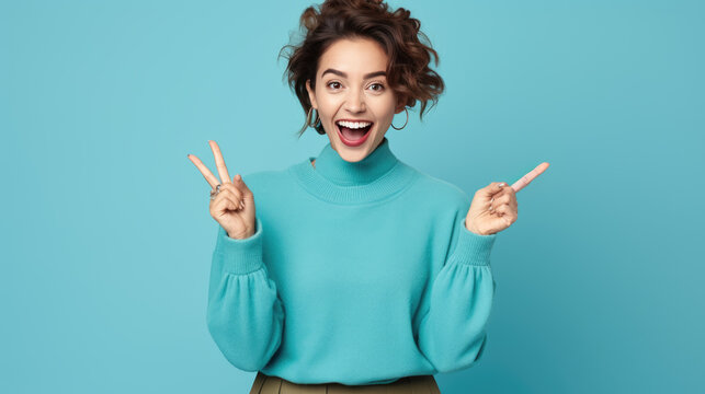 Young woman wearing casual clothes pointing with hand and finger to the side looking at the camera.