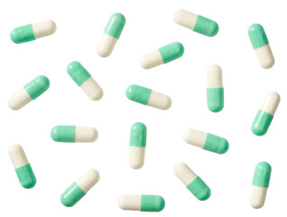 Green capsules isolated on white background, top view.