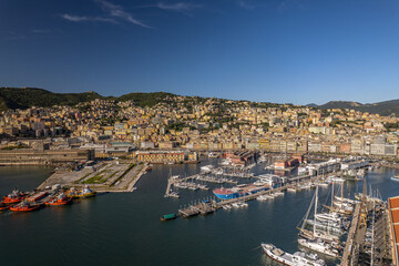 Fototapeta na wymiar The drone aerial view of Genova port and the downtown district, Italy. Genoa is a city in and the capital of the Italian region of Liguria. 