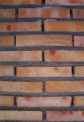 Red brick wall background texture close up