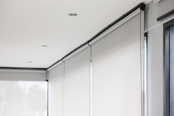 white curtain or white blinds Roller sun protection for house.