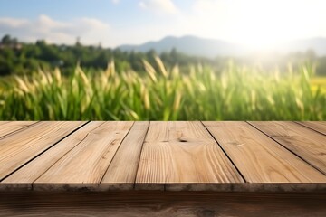 Wooden plank floor table and empty front, and natural rice fields, fresh atmosphere, sunlight in the early morning background,
