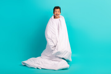 Full length portrait of positive astonished person open mouth unbelievable covered blanket isolated...