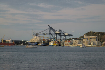 Santa Marta, Colombia - December 30 2022: Beautiful Harbor view with container ships in port of Santa Marta in Colombia