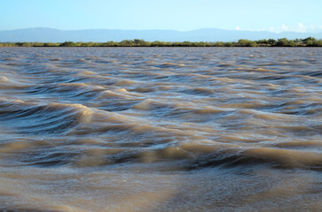Los Flamencos National Reserve, Colombia - January 2 2023: Sunset sea close-up view romantic beautiful background