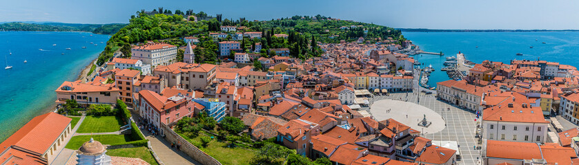 Fototapeta na wymiar A panorama view west from the cathedral tower in the town of Piran, Slovenia in summertime