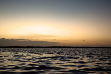 Los Flamencos National Reserve, Colombia - January 2 2023: Sunset sea close-up view romantic beautiful background