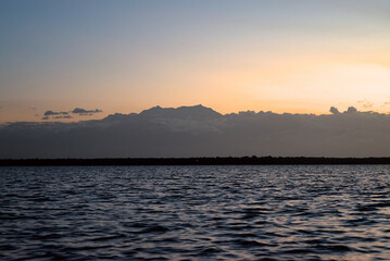 Los Flamencos National Reserve, Colombia - January 2 2023: Sunset sea close-up view romantic beautiful background