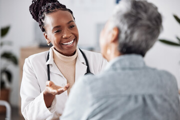 Smile, black woman or doctor consulting a patient in meeting in hospital for healthcare feedback or support. Happy, medical or nurse with a mature person talking or speaking of test results or advice - Powered by Adobe