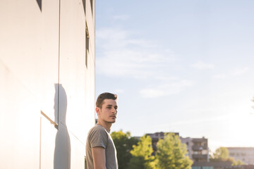 Portrait of young caucasian serene man outdoors carefree