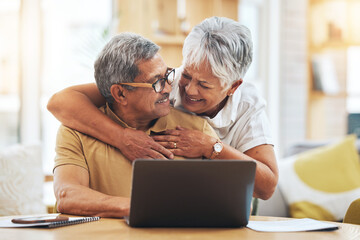 Laptop, senior couple and hug at table in home, bonding and care together on social media. Computer, embrace and elderly man and woman happy, smile and connection to support, love and typing email