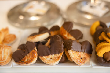 Ialian cookies in a bakery shop window glass case
