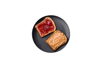 Nutritious sandwiches consisting of bread, raspberry jam and peanut butter
