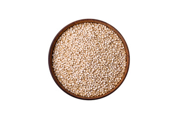 Wholesome raw quinoa in a bowl on a dark concrete background