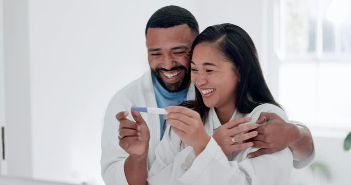 Pregnancy test, wow and excited couple hug in a bathroom in celebration of fertility success in their house. Pregnant, family planning and happy man with woman embrace while checking home testing kit