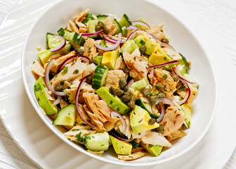 tuna salad with avocado, onion, cucumber, capers