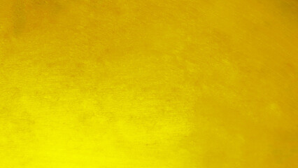 Background with gold foil texture Yellow has a copper and black reflection.
