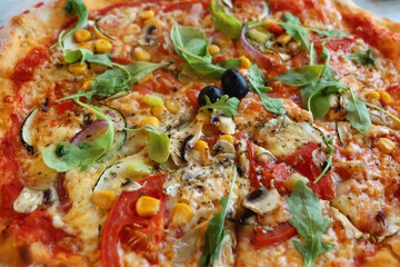 Vegetarian pizza with seasonal vegetable. Selective focus, close-up.