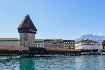 The Kapellbrucke (literally, Chapel Bridge), a covered wooden footbridge spanning the river Reuss...