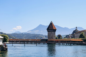 The Kapellbrucke (literally, Chapel Bridge), a covered wooden footbridge spanning the river Reuss...