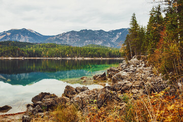 lake reflection in the mountains, Lake Eibsee, Bavaria, Germany, autumn, fall