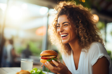 Restaurant Indulgence: Woman Relishing Burger